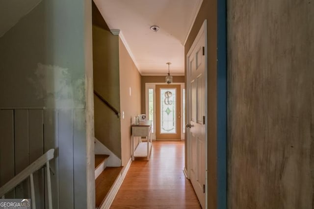 1025 Northridge Rd, Ball Ground, GA 30107 - hall featuring ornamental molding, wood finished floors, and stairs