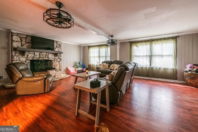 1025 Northridge Rd, Ball Ground, GA 30107 - living area with wood finished floors, a fireplace, and beamed ceiling