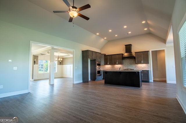 776 Fleeting Way, Monroe, GA 30655 - kitchen with custom exhaust hood, vaulted ceiling, oven, open floor plan, and decorative backsplash