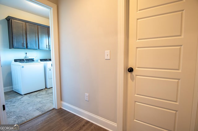 776 Fleeting Way, Monroe, GA 30655 - hall with washer and dryer and dark wood-type flooring