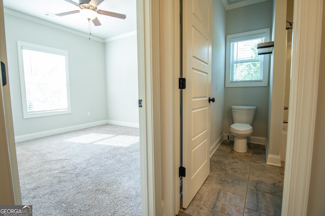 776 Fleeting Way, Monroe, GA 30655 - bathroom with ornamental molding, a ceiling fan, and a tub to relax in