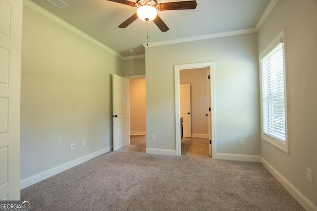 776 Fleeting Way, Monroe, GA 30655 - unfurnished bedroom with ornamental molding, carpet floors, and ceiling fan