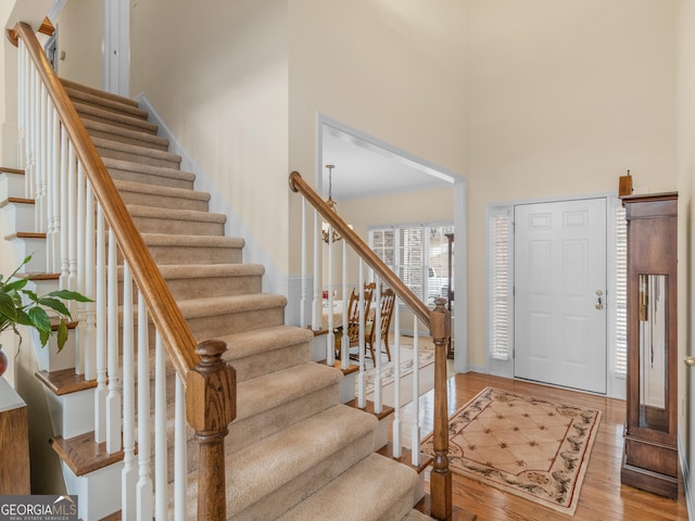 17 Rocky Mountain Pass, Adairsville, GA 30103 - entryway featuring a towering ceiling, stairway, and light wood-style floors