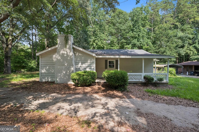 6770 Burkhead Dr, Union City, GA 30291 - view of front of house with a chimney and covered porch