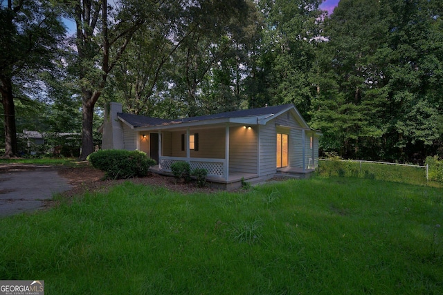 6770 Burkhead Dr, Union City, GA 30291 - view of front facade with covered porch and a chimney