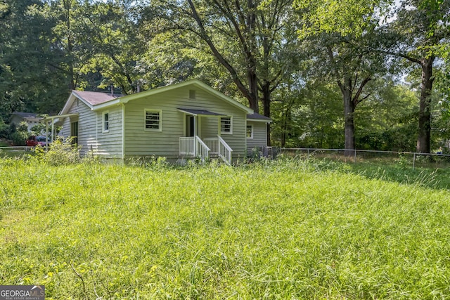 6770 Burkhead Dr, Union City, GA 30291 - rear view of property featuring view of wooded area