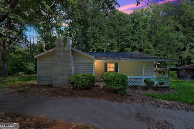 6770 Burkhead Dr, Union City, GA 30291 - view of front of property featuring a chimney and covered porch