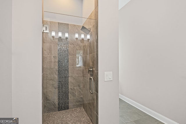 124 E Broad St, Newnan, GA 30263 - bathroom with a stall shower and baseboards