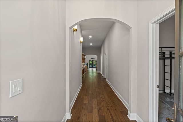 124 E Broad St, Newnan, GA 30263 - corridor featuring arched walkways, dark wood finished floors, and recessed lighting