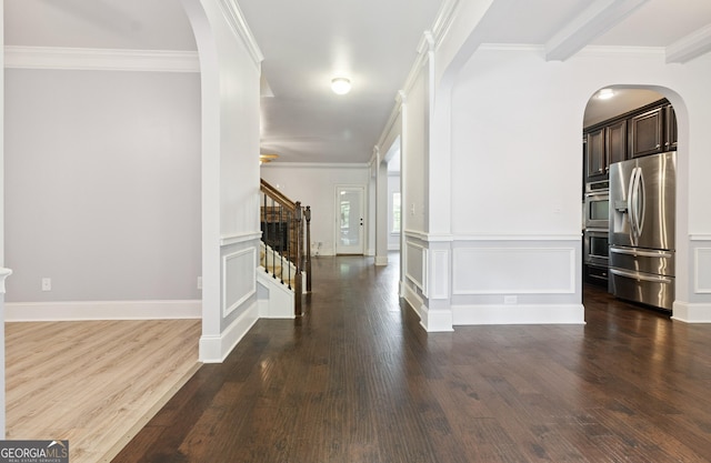 416 Fairway Dr, Acworth, GA 30101 - hall featuring stairs, arched walkways, wood finished floors, and crown molding