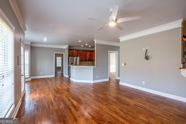 4311 Hampton Mill Pkwy, Douglasville, GA 30135 - unfurnished living room with ceiling fan, crown molding, dark wood-style floors, and recessed lighting