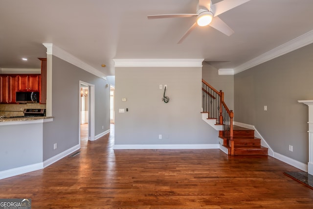 4311 Hampton Mill Pkwy, Douglasville, GA 30135 - unfurnished living room with crown molding, stairs, a ceiling fan, and dark wood finished floors