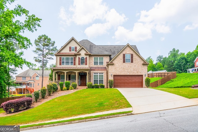 4311 Hampton Mill Pkwy, Douglasville, GA 30135 - view of front of home featuring an attached garage, driveway, a porch, and brick siding