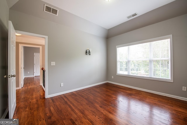 4311 Hampton Mill Pkwy, Douglasville, GA 30135 - empty room with vaulted ceiling and dark wood-type flooring