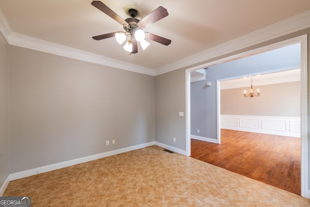 4311 Hampton Mill Pkwy, Douglasville, GA 30135 - unfurnished room with a chandelier, ornamental molding, and a ceiling fan