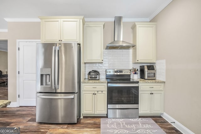 230 Thorpe Rd, Jackson, GA 30233 - kitchen featuring stainless steel appliances, wall chimney range hood, cream cabinets, and ornamental molding