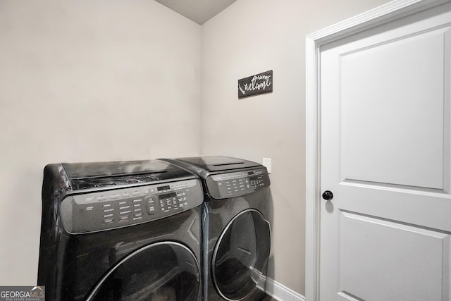 230 Thorpe Rd, Jackson, GA 30233 - laundry area with washer and dryer and baseboards