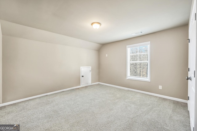 230 Thorpe Rd, Jackson, GA 30233 - empty room featuring carpet floors and vaulted ceiling