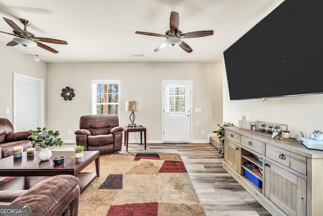 230 Thorpe Rd, Jackson, GA 30233 - living room featuring a ceiling fan and light wood-type flooring