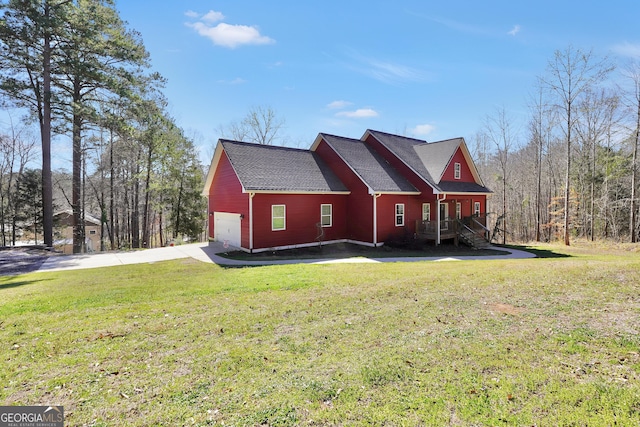230 Thorpe Rd, Jackson, GA 30233 - view of property exterior with a lawn, driveway, a shingled roof, and an attached garage