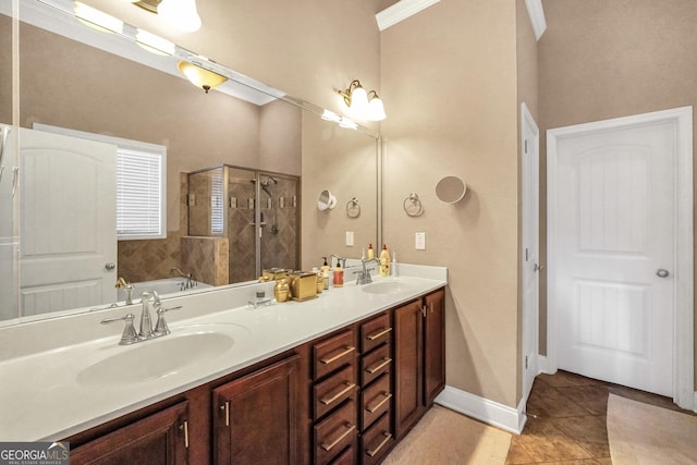 204 Carmell Ct, Mcdonough, GA 30252 - full bath featuring a stall shower, double vanity, a bath, and tile patterned flooring