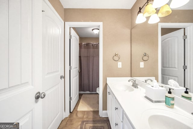 204 Carmell Ct, Mcdonough, GA 30252 - full bathroom with double vanity, a chandelier, and tile patterned flooring