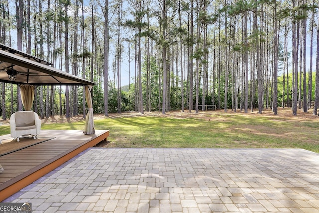 204 Carmell Ct, Mcdonough, GA 30252 - view of patio featuring a ceiling fan and a wooden deck