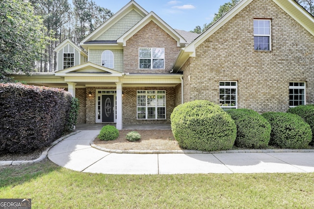 204 Carmell Ct, Mcdonough, GA 30252 - view of front of house with brick siding and covered porch