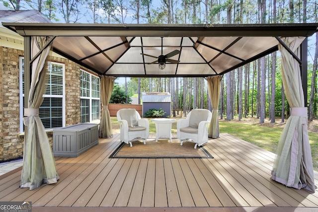 204 Carmell Ct, Mcdonough, GA 30252 - deck with a gazebo, a storage shed, and ceiling fan