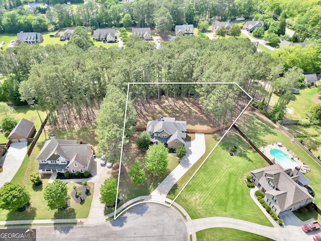 204 Carmell Ct, Mcdonough, GA 30252 - aerial perspective of suburban area featuring property parcel outlined