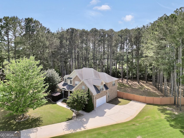 204 Carmell Ct, Mcdonough, GA 30252 - aerial view of property and surrounding area featuring a heavily wooded area