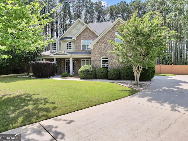 204 Carmell Ct, Mcdonough, GA 30252 - craftsman-style house with brick siding and curved driveway