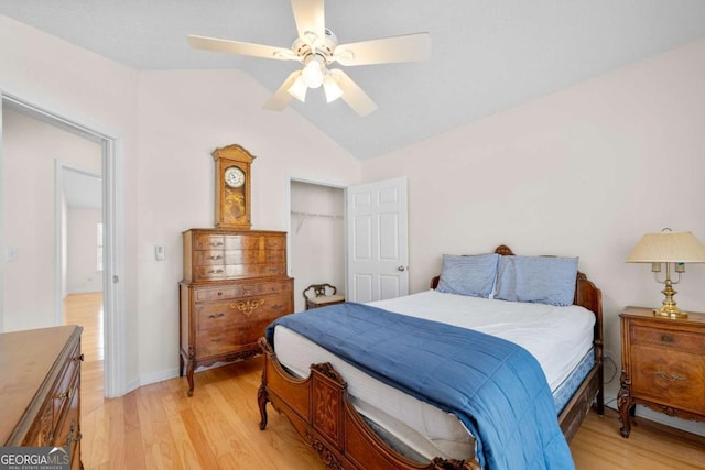 3076 Harris Mill Ct, Duluth, GA 30096 - bedroom with light wood-type flooring, vaulted ceiling, and a ceiling fan
