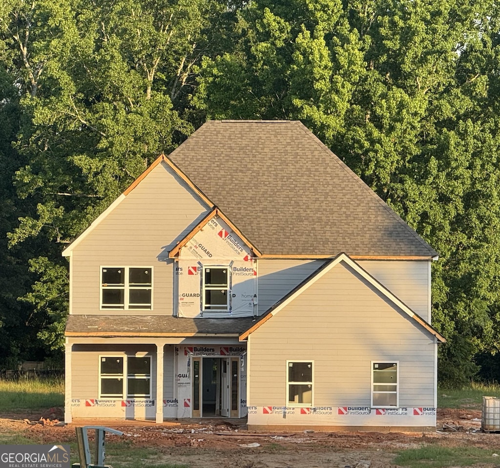 68 Maddox Rd, Mcdonough, GA 30252 - unfinished property featuring covered porch and a shingled roof