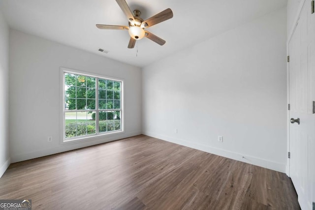 3047 Standing Rock Ct, Lithia Springs, GA 30122 - unfurnished room featuring wood finished floors and a ceiling fan