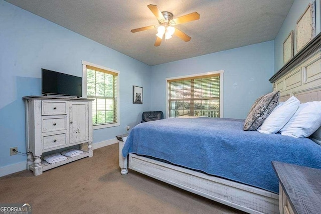 104 Buck Run E, Dahlonega, GA 30533 - carpeted bedroom featuring a textured ceiling and ceiling fan