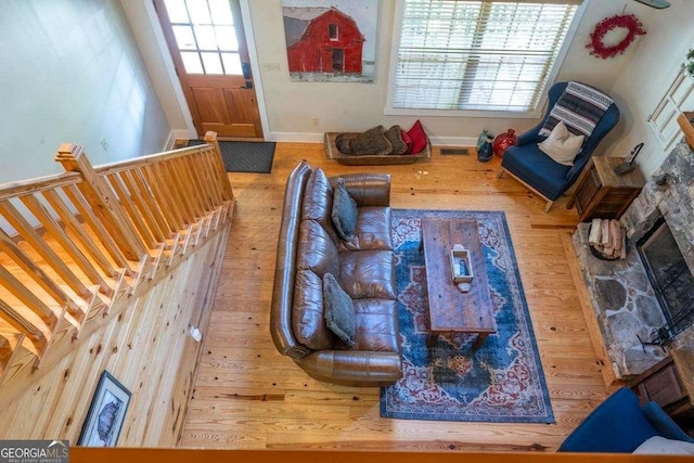104 Buck Run E, Dahlonega, GA 30533 - living room featuring wood finished floors and a fireplace