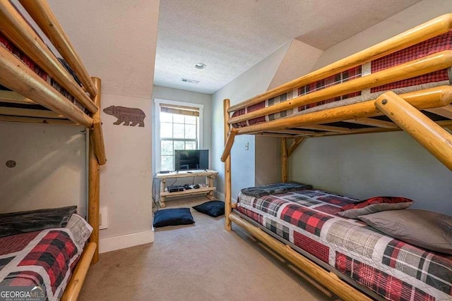 104 Buck Run E, Dahlonega, GA 30533 - carpeted bedroom with a textured ceiling and baseboards