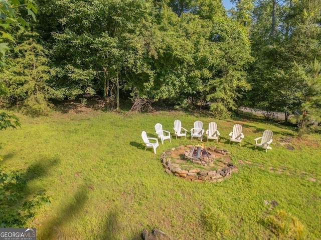 104 Buck Run E, Dahlonega, GA 30533 - view of grassy yard with a fire pit