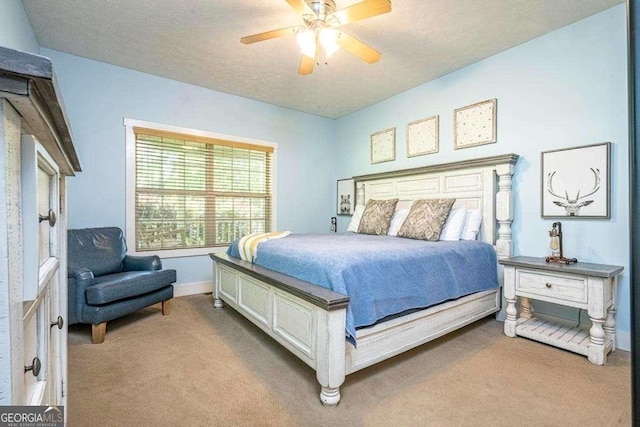 104 Buck Run E, Dahlonega, GA 30533 - bedroom with light carpet, ceiling fan, and a textured ceiling