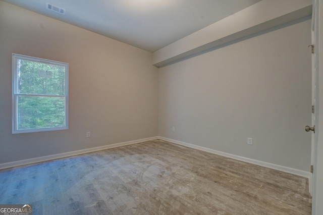 48 Bluejay Ct, Monticello, GA 31064 - unfurnished room with baseboards and wood finished floors