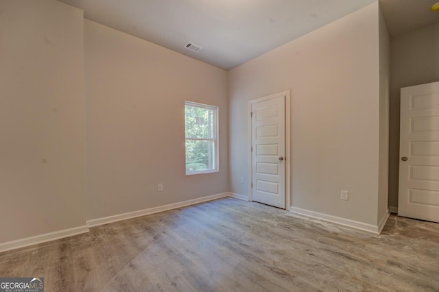 48 Bluejay Ct, Monticello, GA 31064 - empty room with wood finished floors and baseboards