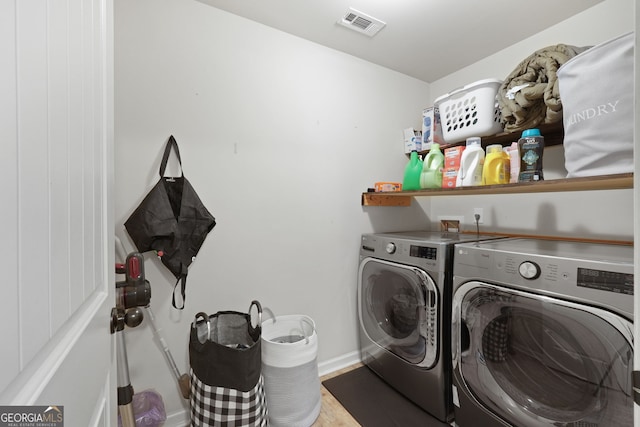 470 Louise Way, Locust Grove, GA 30248 - laundry room with separate washer and dryer and wood finished floors