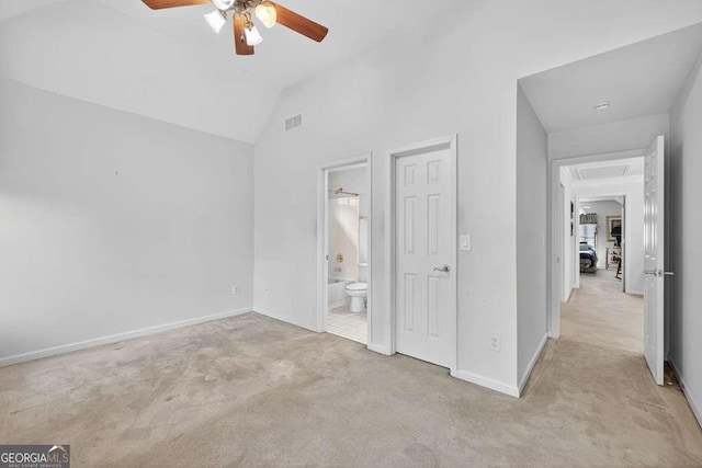 2002 Ivy Ridge Rd SE, Smyrna, GA 30080 - unfurnished bedroom featuring carpet floors, lofted ceiling, ensuite bath, attic access, and ceiling fan