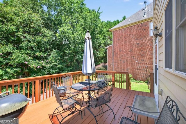 2002 Ivy Ridge Rd SE, Smyrna, GA 30080 - wooden deck with outdoor dining space