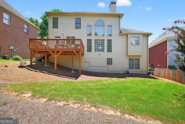 2002 Ivy Ridge Rd SE, Smyrna, GA 30080 - back of property featuring a wooden deck and a chimney