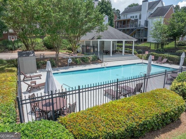 2002 Ivy Ridge Rd SE, Smyrna, GA 30080 - community pool featuring a patio and a gazebo