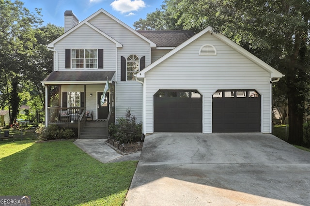67 Woodlawn Dr, Toccoa, GA 30577 - traditional home with a garage, a porch, driveway, a chimney, and a front lawn
