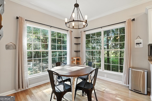 67 Woodlawn Dr, Toccoa, GA 30577 - dining area featuring ornamental molding, a chandelier, light wood finished floors, and healthy amount of natural light
