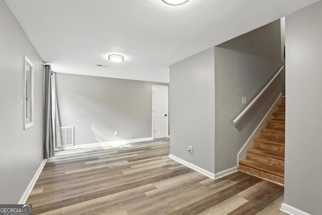 67 Woodlawn Dr, Toccoa, GA 30577 - spare room with wood finished floors and stairway